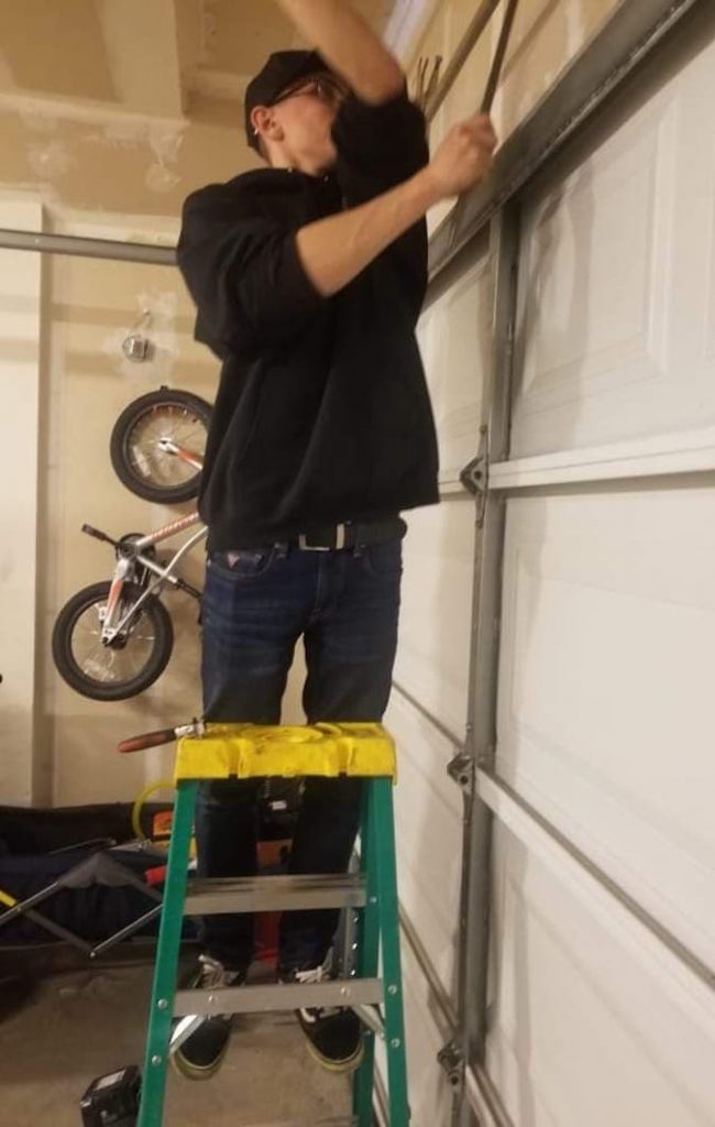 Napa Garage Door Repair, technician repairing a broken spring